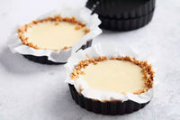 Set of 4 non-stick mini baking pans with removable base ø10cm