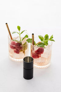 Verre mesureur noir 30/50ml