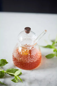 Set of honey jar and dipper