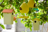 Nichoir en fibre de bambou taupe avec toit terracotta