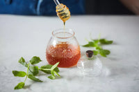 Set of honey jar and dipper