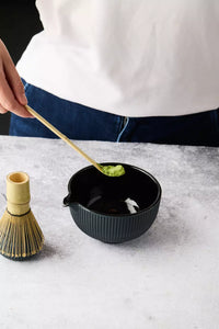 4-piece cast iron matcha set with bowl, holder, whisk and spoon