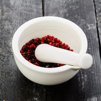 Mortier et pilon blanc