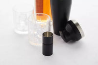 Verre mesureur noir 30/50ml