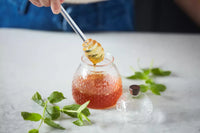 Set of honey jar and dipper