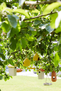Vogelhuisje uit bamboevezel taupe met okergeel dak