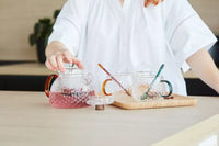 Set van theepot met filter, 2 mokken en lepeltjes