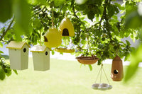 Vogelhuisje uit bamboevezel taupe met okergeel dak